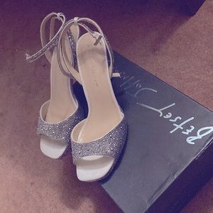 Betsey Johnson high heal shoes. 4in heal. Very sparkly!!!